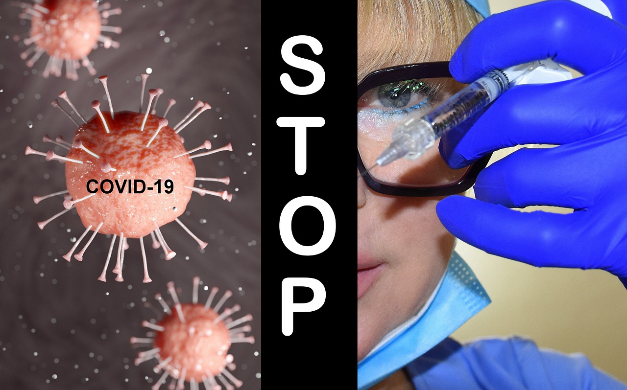 Chercheur administrant un vaccin avec le message « stop covid-19 ».